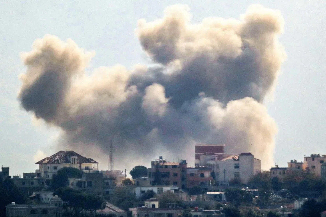 Smoke rises from the site of an Israeli airstrike that targeted an area in the southern Lebanese village of Khiam on Oct 30, 2024.