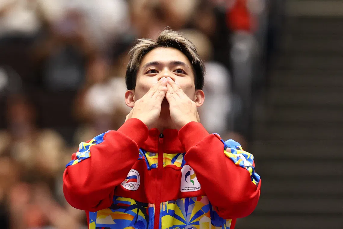 Filipino trailblazer Carlos Yulo adds Asian Games gold to Olympic success in gymnastics