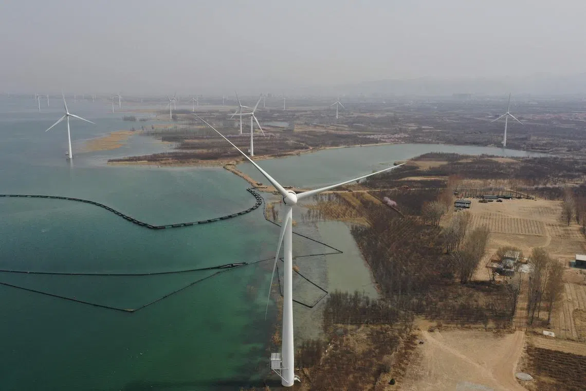 Wind turbines belonging to Chinese company, Goldwind, in Zhangjiakou, in northern China's Hebei province, on March 26, 2025. 