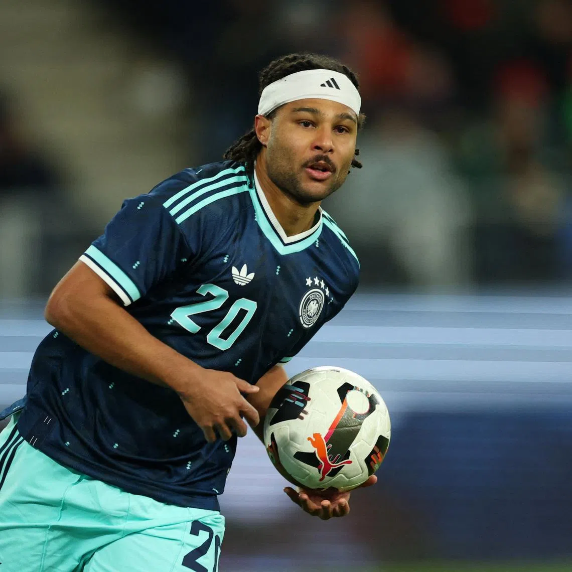 Soccer Football - International Friendly - Switzerland v Germany - St. Jakob-Park, Basel, Switzerland - March 27, 2026 Germany's Serge Gnabry celebrates scoring their second goal REUTERS/Denis Balibouse/File Photo
