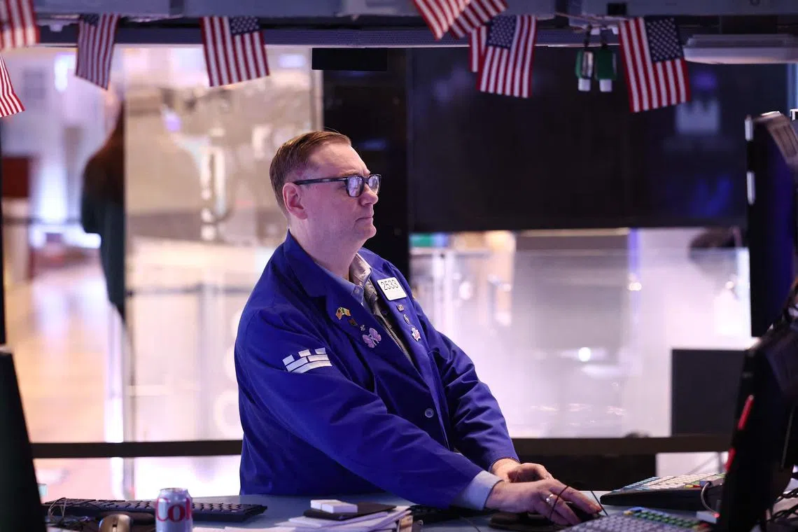 Traders working on the floor of the New York Stock Exchange on Jan 22, in New York City.
