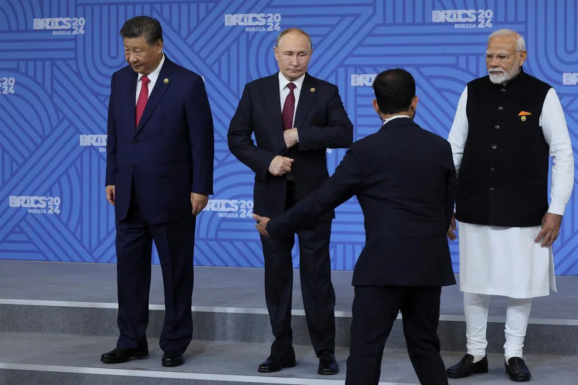 (From left) Chinese President Xi Jinping, Russian President Vladimir Putin and Indian Prime Minister Narendra Modi at the Brics summit in Kazan, Russia, on Oct 23.