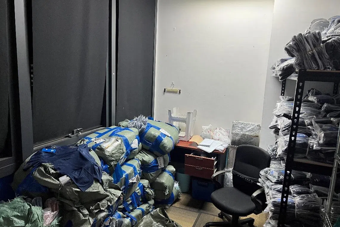 More than 3,900 pieces of purported trademark-infringing sports apparel, with an estimated street value of more than $71,000, and cash amounting to more than $270 were seized. 