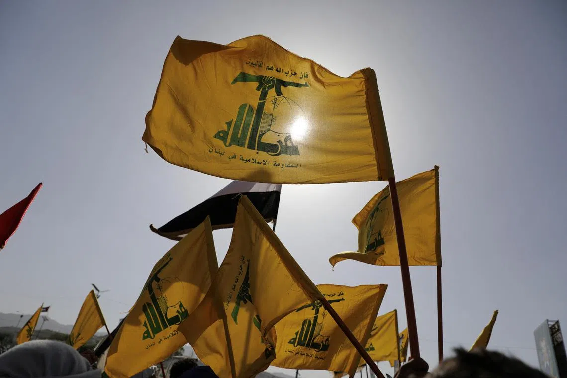 Hezbollah flags flutter as protesters, mainly Houthi supporters, rally to show support to Palestinians in the Gaza Strip and Lebanon's Hezbollah, in Sanaa, Yemen September 27, 2024. REUTERS/Khaled Abdullah/ File Photo