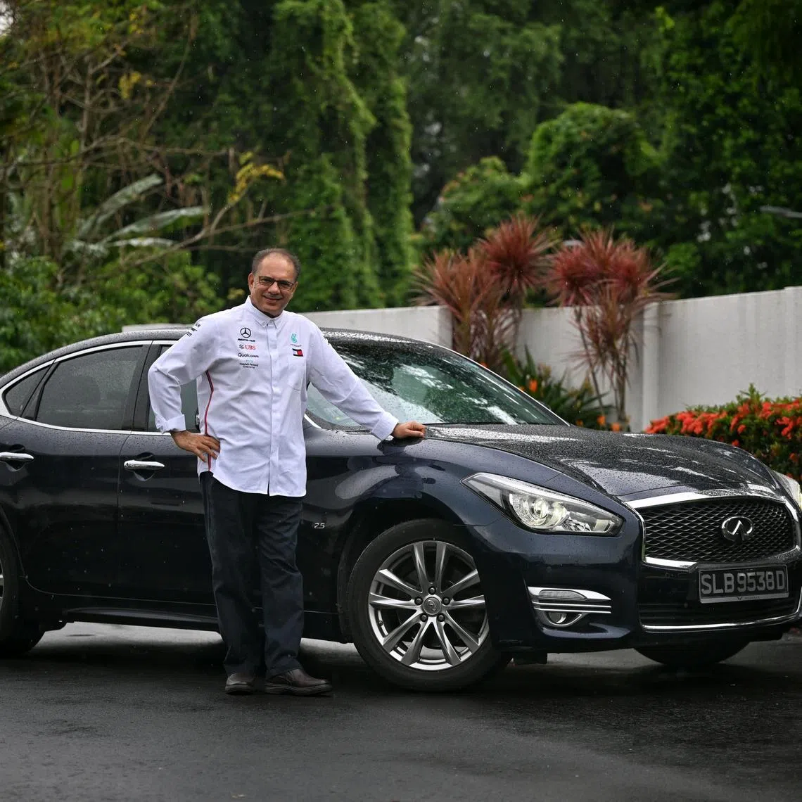 Me and My Car column - Dr Zafar Momin, 66, Professor and board director, with his Infiniti, on May 15, 2025.