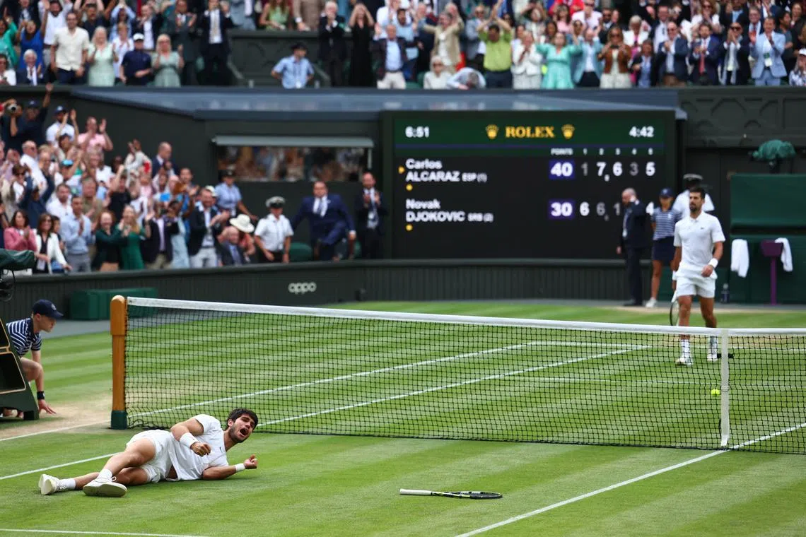 Spain's Carlos Alcaraz celebrates after winning his final match against Serbia's Novak Djokovic.