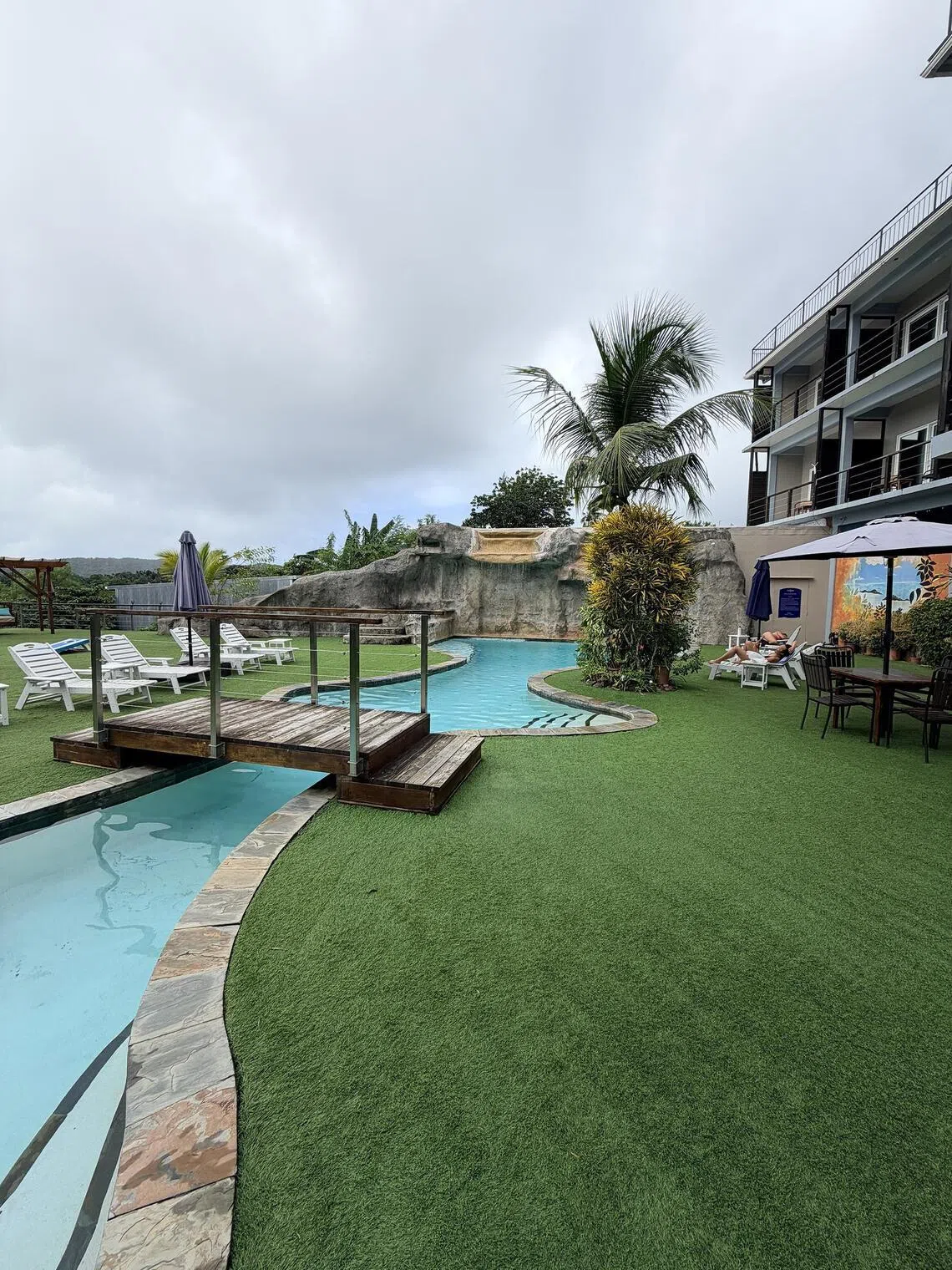Palau Central Hotel has clean, resort-style rooms, a small pool and lounge area, and a modest buffet breakfast. 