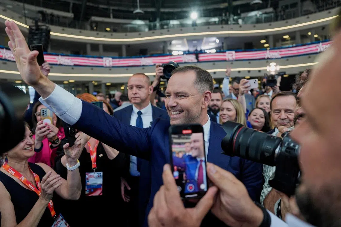 Poland's conservative presidential candidate Karol Nawrocki, center, arrives at the Conservative Political Action Conference, CPAC, in Jasionka, Poland, May 27, 2025. Alex Brandon/Pool via REUTERS/ File Photo