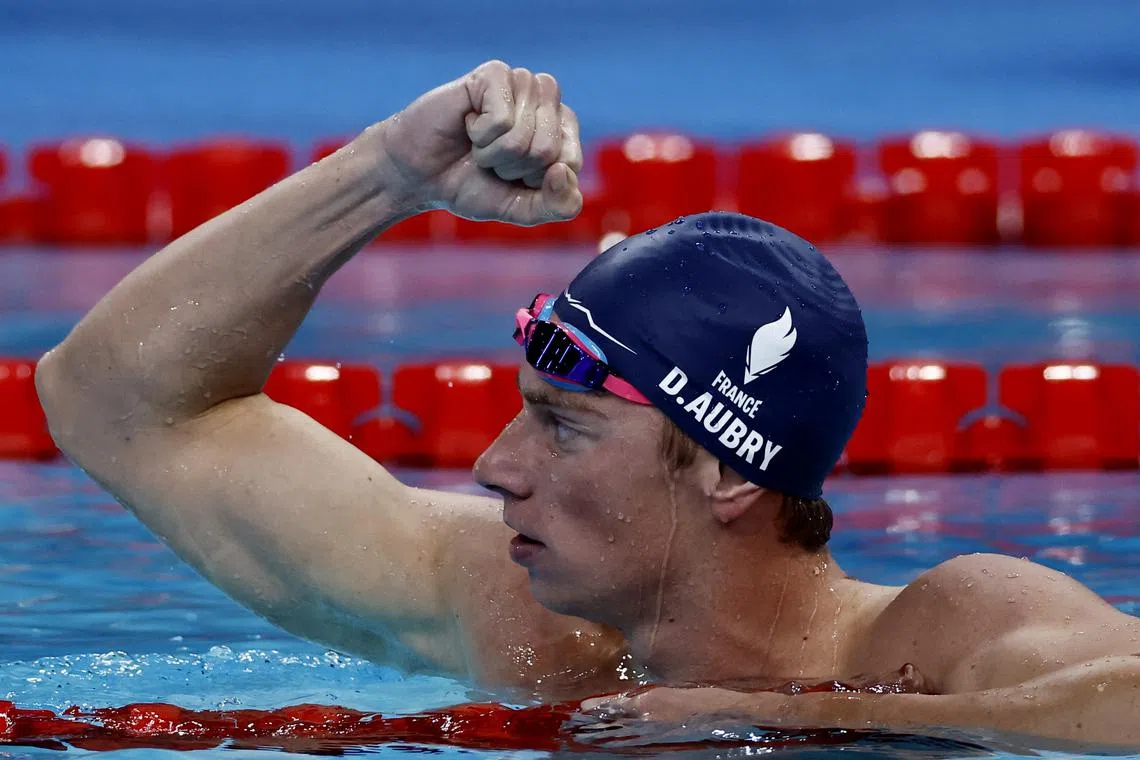 Paris 2024 Olympics - Swimming - Men's 800m Freestyle - Heats - Paris La Defense Arena, Nanterre, France - July 29, 2024.  David Aubry of France reacts after winning. REUTERS/Clodagh Kilcoyne