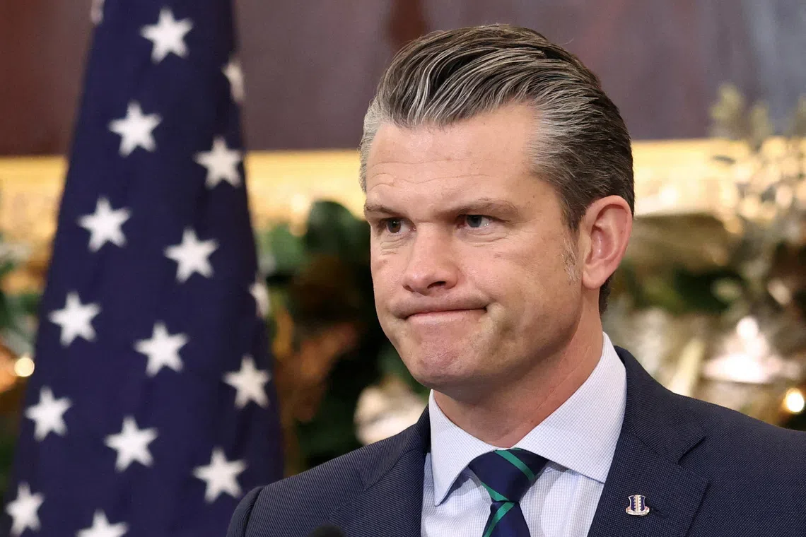 U.S. Secretary of Defense Pete Hegseth listens to remarks during the Australia-United States Ministerial Consultations (AUSMIN) at the  State Department in Washington, D.C., U.S., December 8, 2025. REUTERS/Kevin Lamarque
