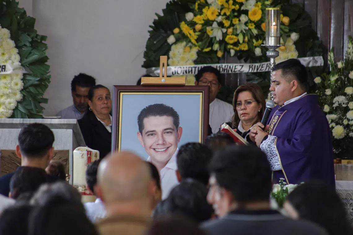 FILE PHOTO: A portrait of Alejandro Arcos, the mayor of Chilpancingo who was killed on Sunday less than a week after taking office, is shown at his funeral service as Mexico's President Claudia Sheinbaum is set to unveil a new security policy, in Chilpancingo, Mexico October 7, 2024. REUTERS/Oscar Ramirez/File Photo