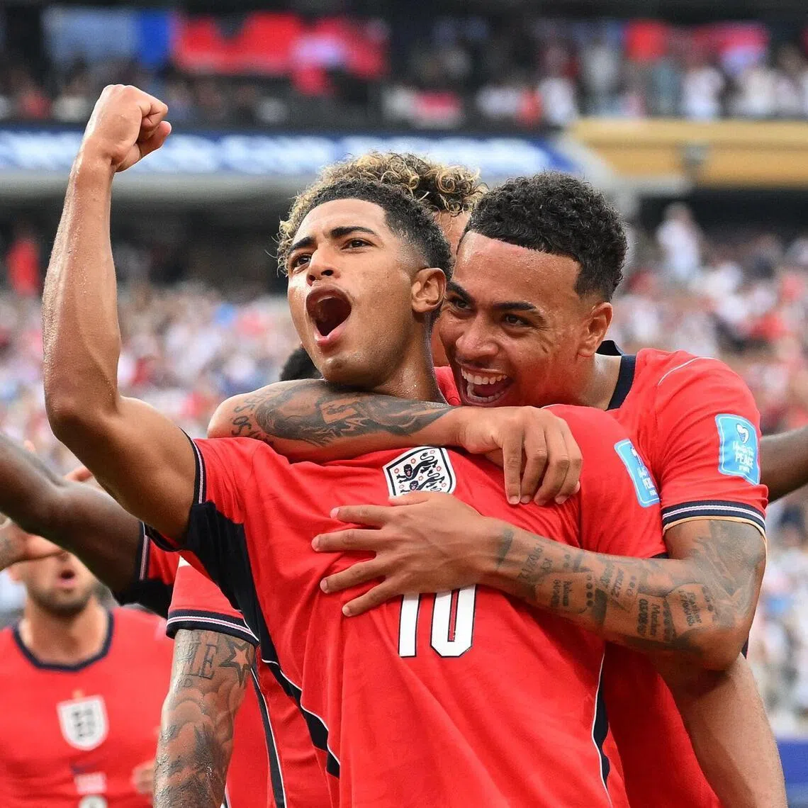 Morgan Rogers hugging Jude Bellingham after the latter scores the opener in the 2-0 World Cup win over Panama on June 27.