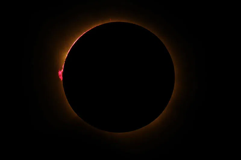 The Sun’s corona glows as the Moon completely blocks the Sun during the totality phase of the total solar eclipse as seen from Lodoso, Burgos province, on August 12, 2026.