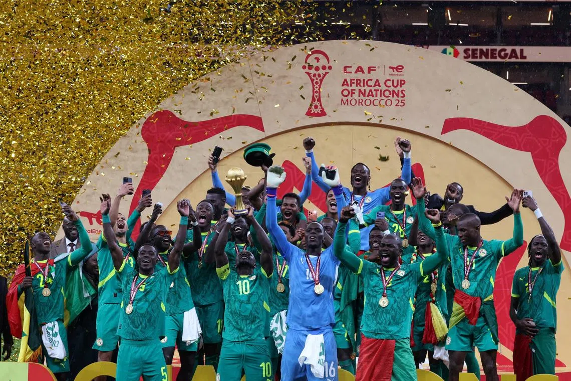 FILE PHOTO: Soccer Football - CAF Africa Cup of Nations - Morocco 2025 - Final - Senegal v Morocco - Prince Moulay Abdellah Stadium, Rabat, Morocco - January 18, 2026 Senegal's Sadio Mane lifts the trophy with teammates as they celebrate after winning the Africa Cup of Nations REUTERS/Amr Abdallah Dalsh/File Photo