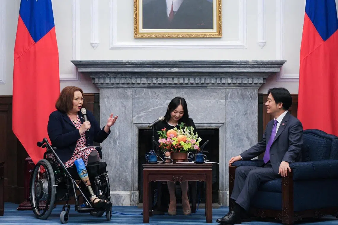 Taiwan's President Lai Ching-te (right) listening to US Senator Tammy Duckworth (left) during a meeting at the Presidential Office in Taipei.