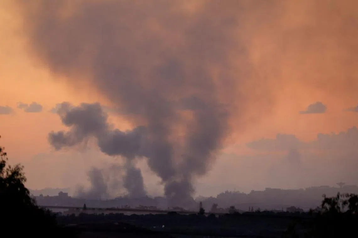 Smoke rises above Gaza, as seen from southern Israel, amid the ongoing conflict between Israel and the Palestinian group Hamas, November 15, 2023. REUTERS/Alexander Ermochenko