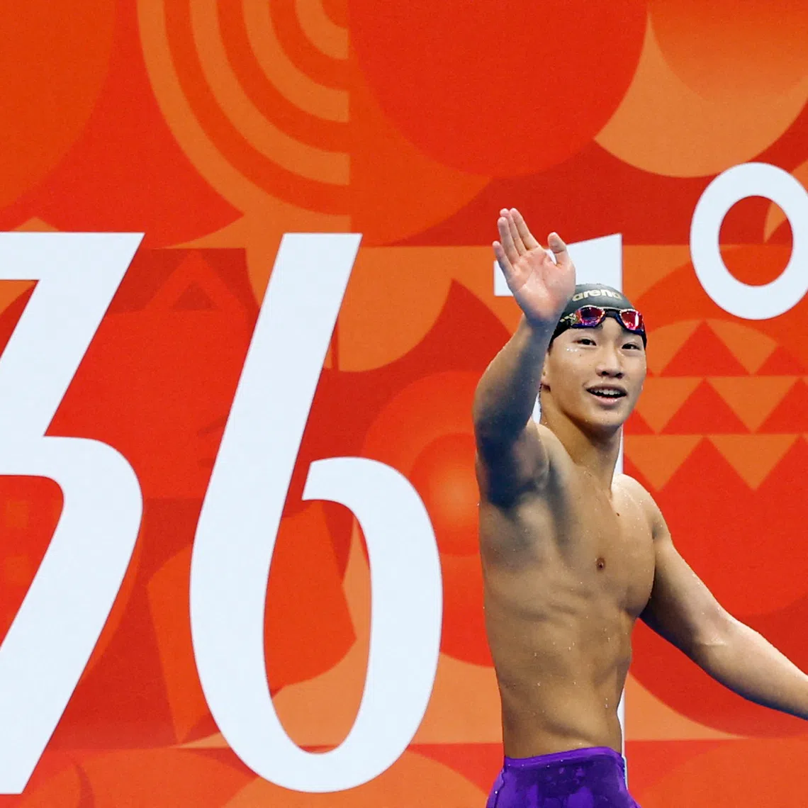 Asian Games - Aichi-Nagoya 2026 - Swimming - Tokyo Aquatics Centre, Koto, Tokyo, Japan - September 24, 2026 Japan's Shin Ohashi celebrates winning gold in the Men's 200m Breaststroke Final REUTERS/Manami Yamada