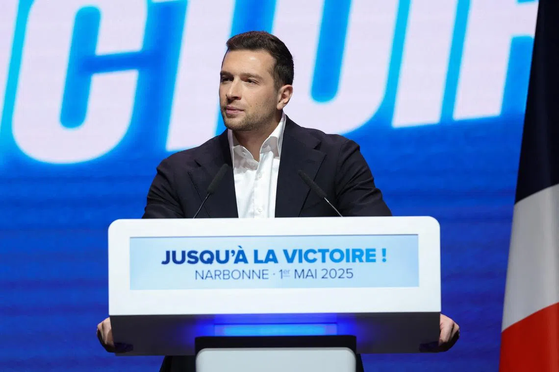 French far-right leader Jordan Bardella, president of the National Rally (RN) party, addresses the audience at a political rally for May Day in Narbonne, France, May 1, 2025. REUTERS/Manon Cruz/File Photo