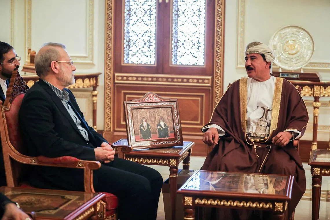 Secretary of the National Security Council, Ali Larijani meets with the Minister of the Royal Office in the Sultanate of Oman, Sultan bin Mohammed al Numani, in Muscat, Oman, February 10, 2026. Iran's National Security Council/WANA (West Asia News Agency)/Handout via REUTERS ATTENTION EDITORS - THIS PICTURE WAS PROVIDED BY A THIRD PARTY.