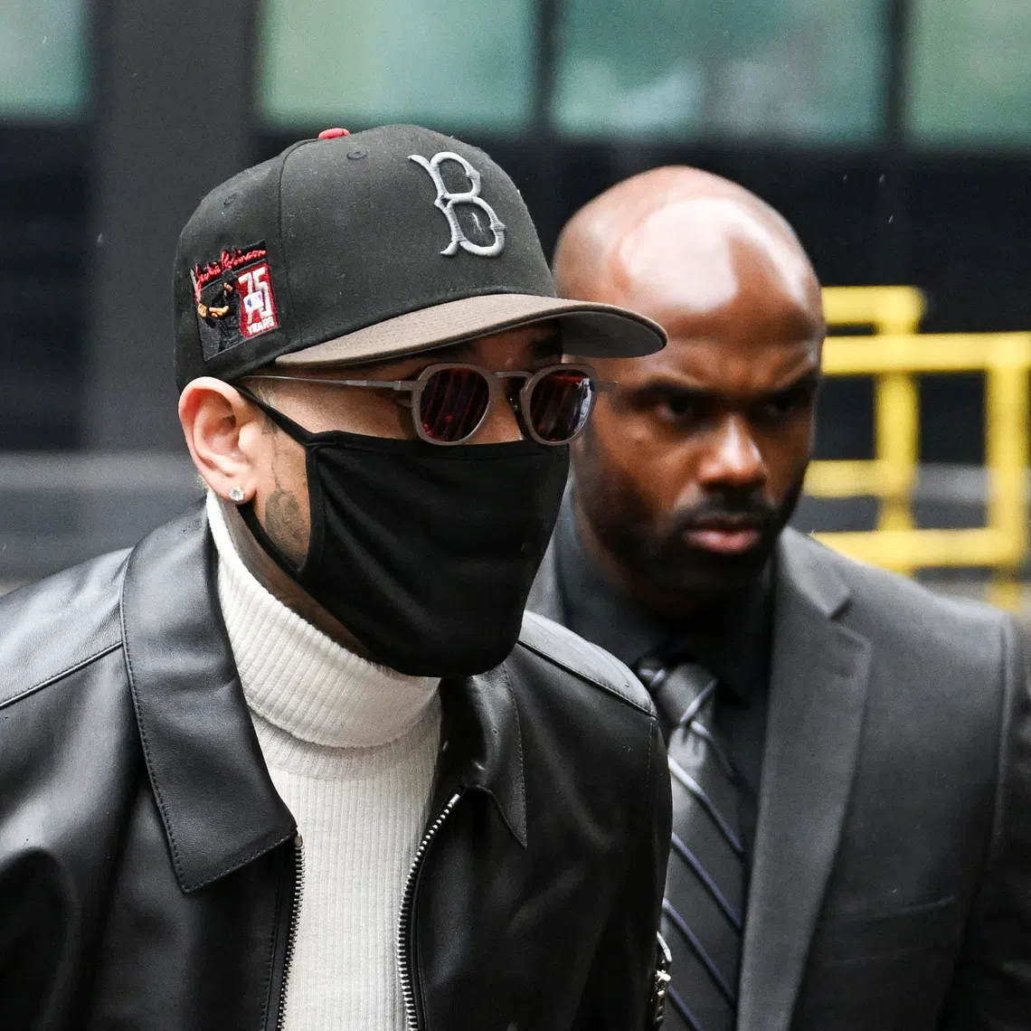 US singer Chris Brown arrives at Southwark Crown Court where he is due to be sentenced after pleading guilty to affray over an incident in which prosecutors said he attacked a music producer with a bottle in a London nightclub in 2023, in London, Britain, October 26, 2026. REUTERS/Chris J Ratcliffe