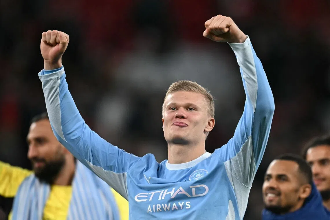 Manchester City’s Norwegian striker Erling Haaland celebrates on the pitch after his side’s 3-0 victory over Liverpool at Anfield on Oct 11.
