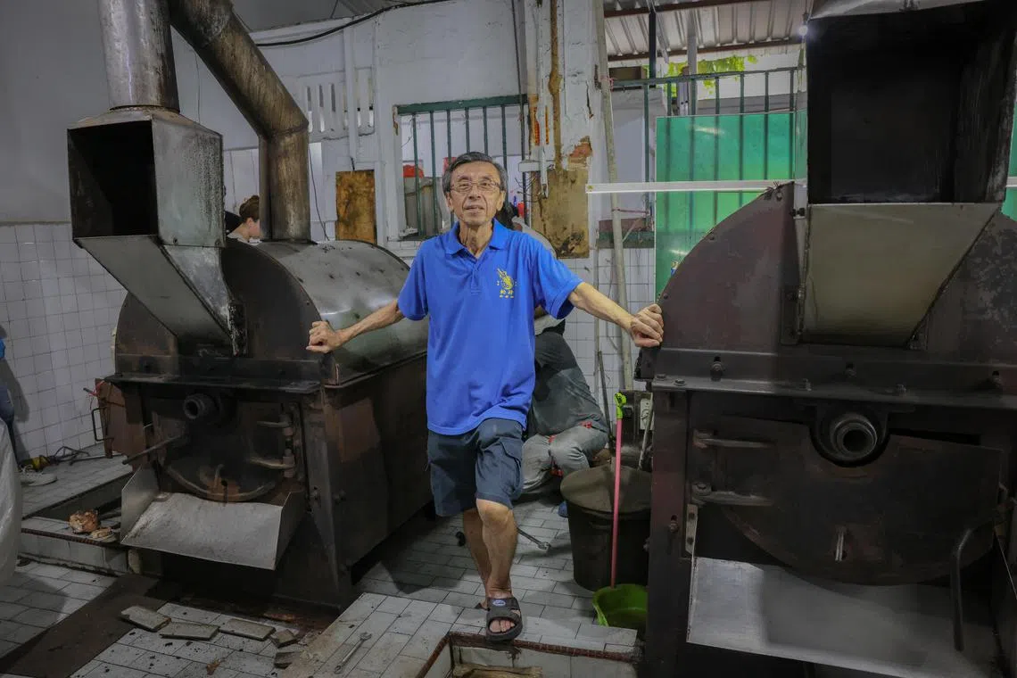 kgcollection28 ST20240423_202427396947 Ong Wee Jin / Ng Keng Gene / 

Dominic Chua, managing director of Ho Tit Coffee Powder Factory, taking a photo with his two industrial-sized coffee roasting machines on April 23, 2024.

National Museum of Singapore is adding contemporary items to the National Collection, as part of its Collecting Contemporary Singapore Initiative. 