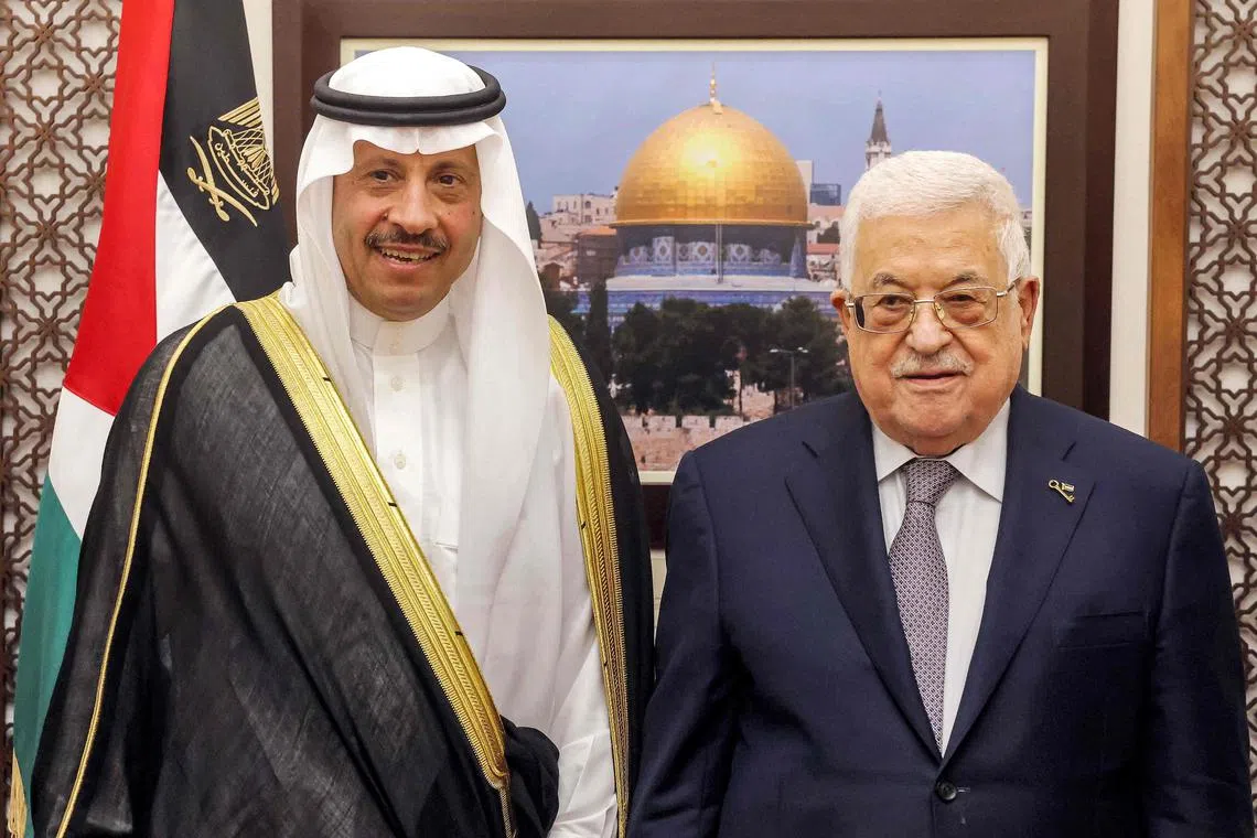 Palestinian president Mahmud Abbas (right) receiving the credentials of Saudi Arabia's Ambassador to Palestine Nayef al-Sudairi on Sept 26.