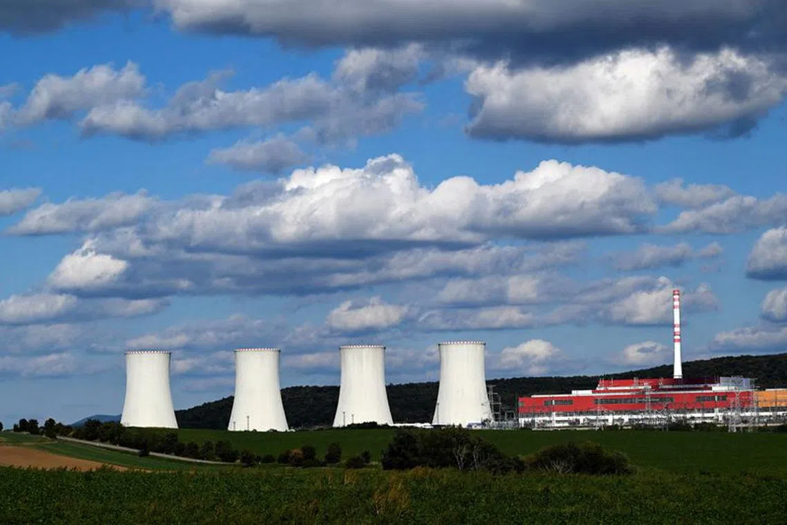 FILE PHOTO: A view shows cooling towers for new third unit at the Mochovce Nuclear Power Plant, in Mochovce, Slovakia, September 12, 2022. REUTERS/Radovan Stoklasa/File Photo