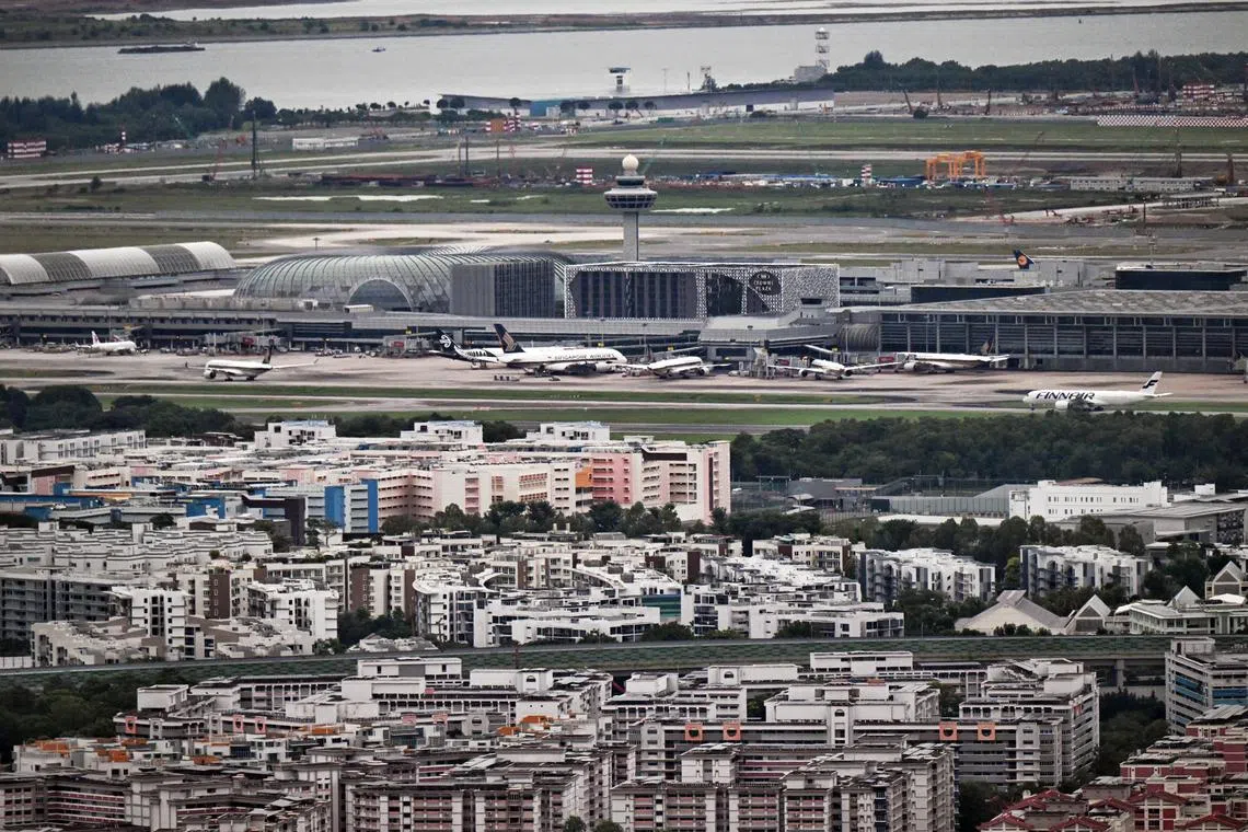 ST20240622_202451392588 Kua Chee Siong/ pixgeneric/ Generic pix of an aerial view of the Changi Airport terminals on June 22, 2024. Can be used for stories about Singapore's upcoming Changi Airport Terminal 5. When operational in the mid-2030s, T5 will be able to handle up to 50 million passengers a year. This is more than the current capacities of Terminals 1 and 3 combined. T5 will be located within the new 1,080ha Changi East development, Changi Airport’s largest expansion project to date that will be three times the size of Marina Bay. It also includes the Changi East Urban District, a business and lifestyle hub next to the terminal.