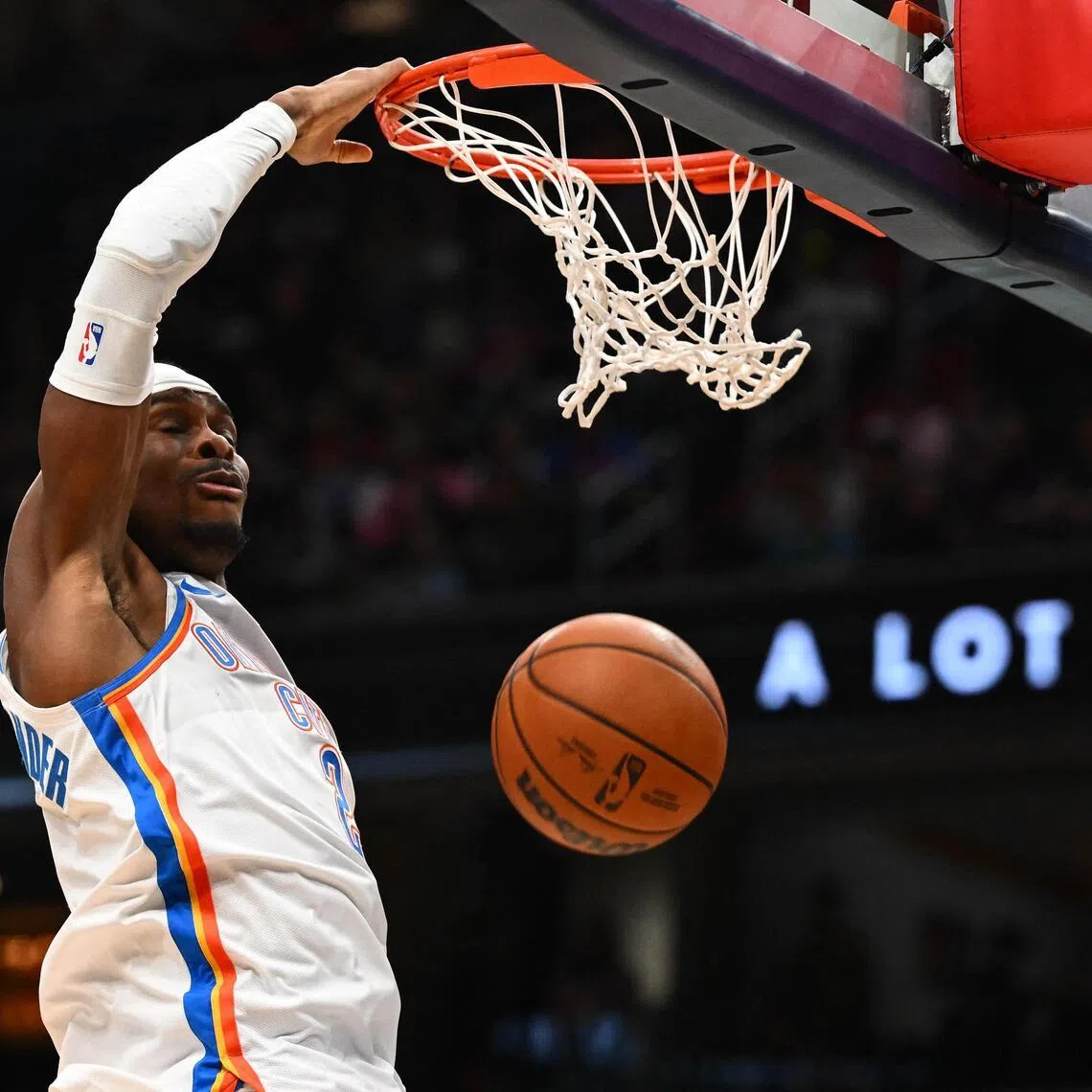 Oklahoma City Thunder guard Shai Gilgeous-Alexander dunking during the 132-111 NBA win over the Washington Wizards at Capital One Arena on March 21, 2026.