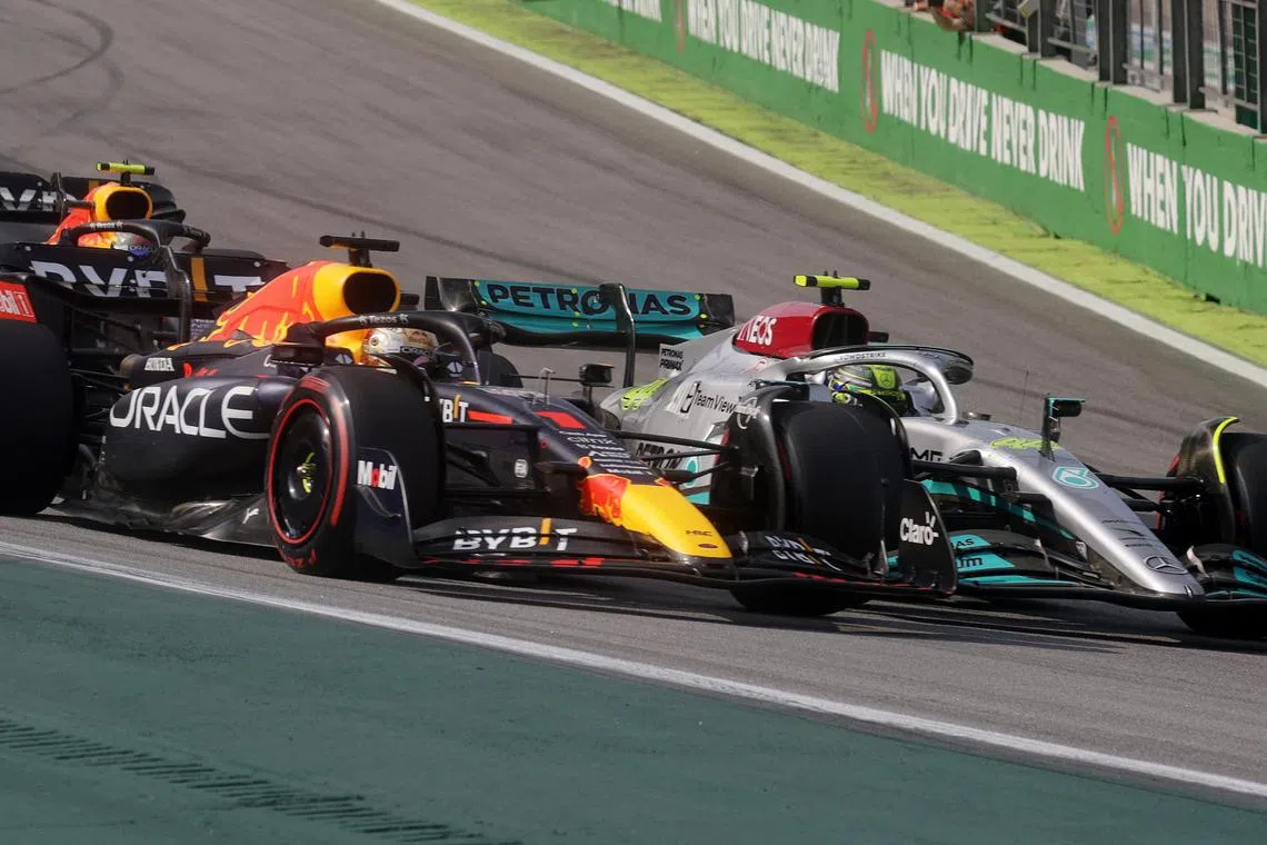 Red Bull's Max Verstappen and Mercedes' Lewis Hamilton in action during the Brazilian Grand Prix.