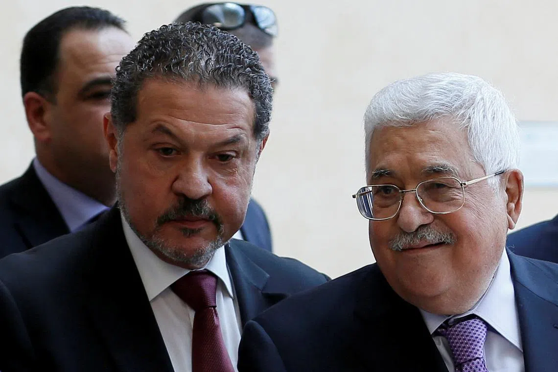 Palestinian President Mahmoud Abbas, accompanied by his son Yasser, leaves a hospital in Ramallah in the Israeli-occupied West Bank, May 28, 2018. REUTERS/Mohamad Torokman/File Photo