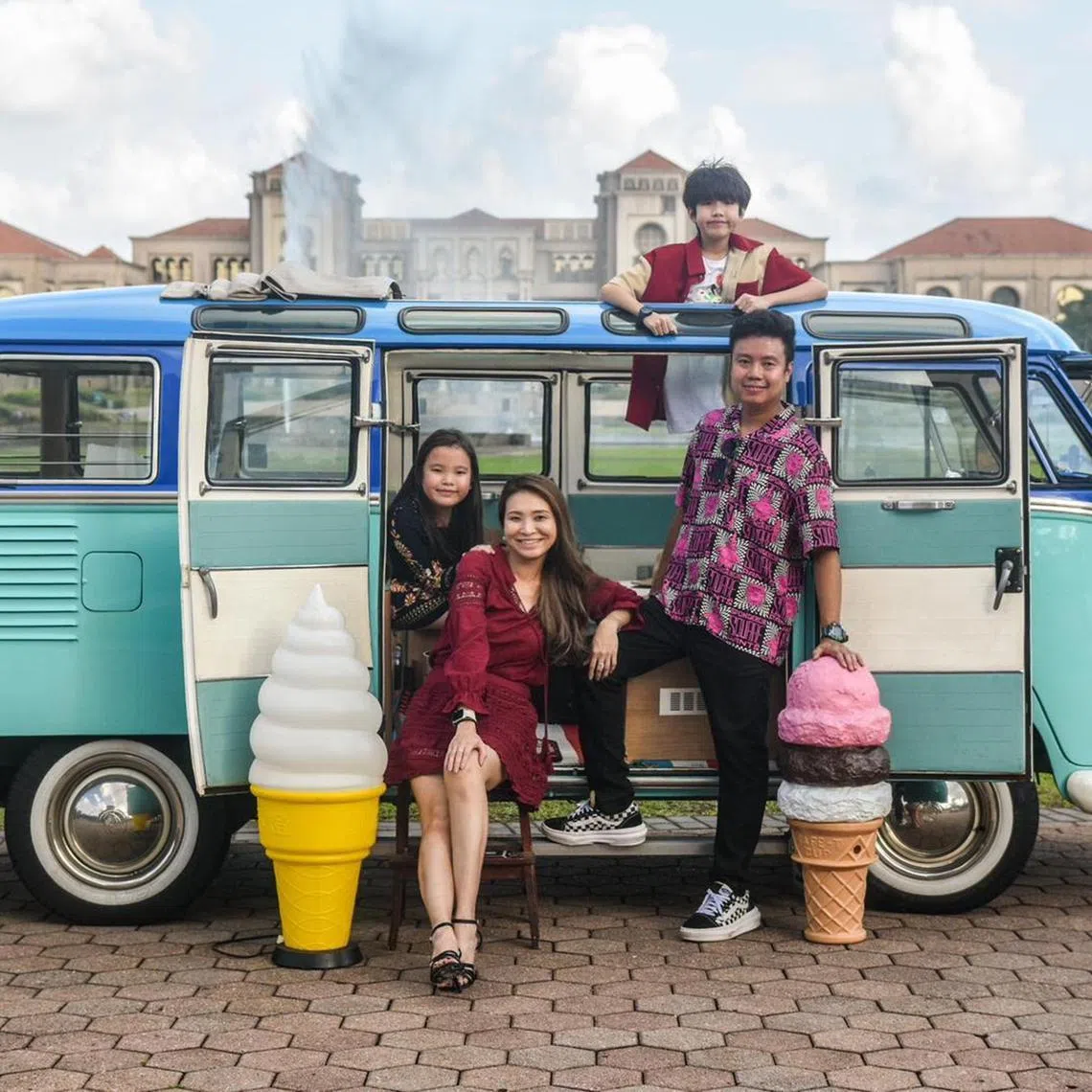 astobias - Tobias Peng with his wife Sheryl Quek, daughter Brea (far left) and son Axel in a photo taken in 2024 in Johor, Malaysia featuring his 1956 Volkswagen T1 Deluxe Kombi van with Sunroof. PHOTO CREDIT : ZO TAN PHOTOGRAPHY