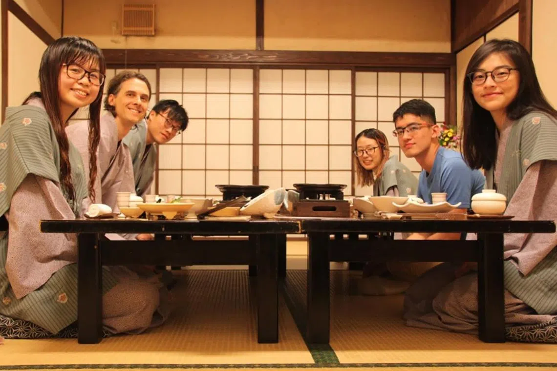 NUS associate professor of Japanese studies Chris McMorran (second from left) with NUS students on a study trip to Japan.