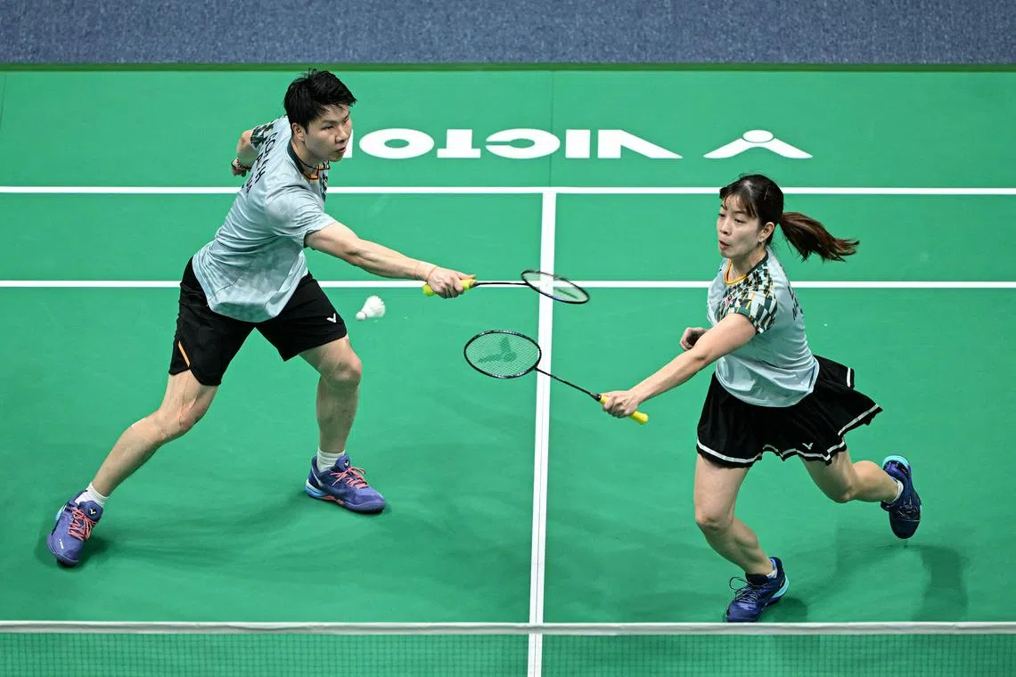 Malaysia's Shevon Jemie Lai and husband Goh Soon Huat in action during the Badminton Asia Championships in Ningbo, China, on April 11.