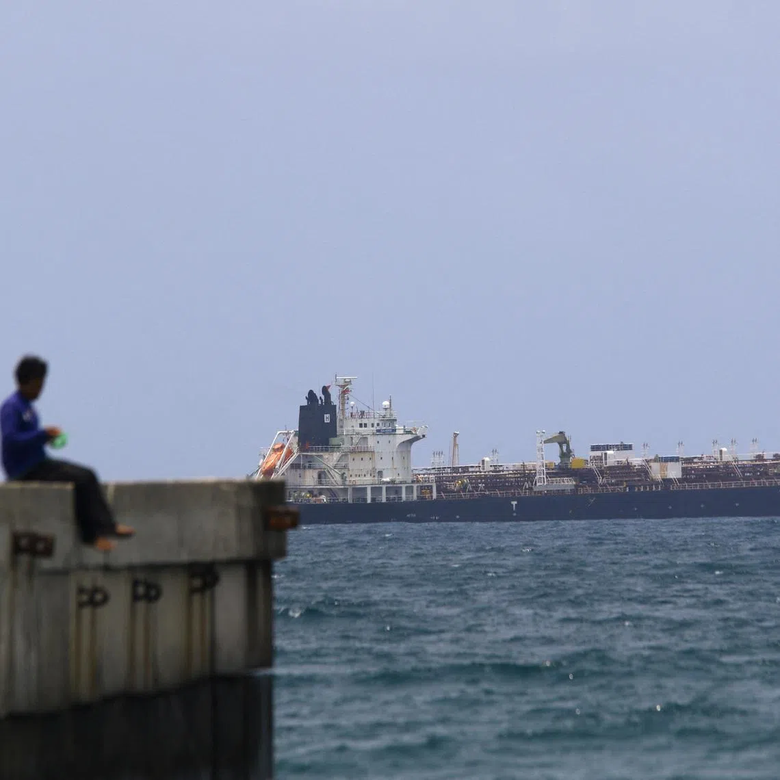 A Hong Kong-flagged vessel, carrying some 200,000 barrels of Russia-origin fuel, is anchored near the coast after arriving in Venezuelan waters, on March 28.