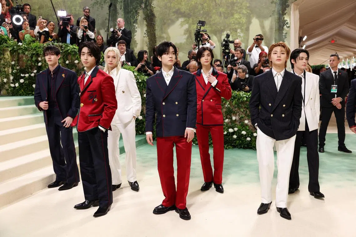 Bang Chan, Han, Felix, Seungmin, Hyunjin, I.N, Lee Know, and Changbin of Stray Kids pose at the Met Gala, an annual fundraising gala held for the benefit of the Metropolitan Museum of Art's Costume Institute with this year's theme 'Sleeping Beauties: Reawakening Fashion' in New York City, New York, U.S., May 6, 2024. REUTERS/Andrew Kelly