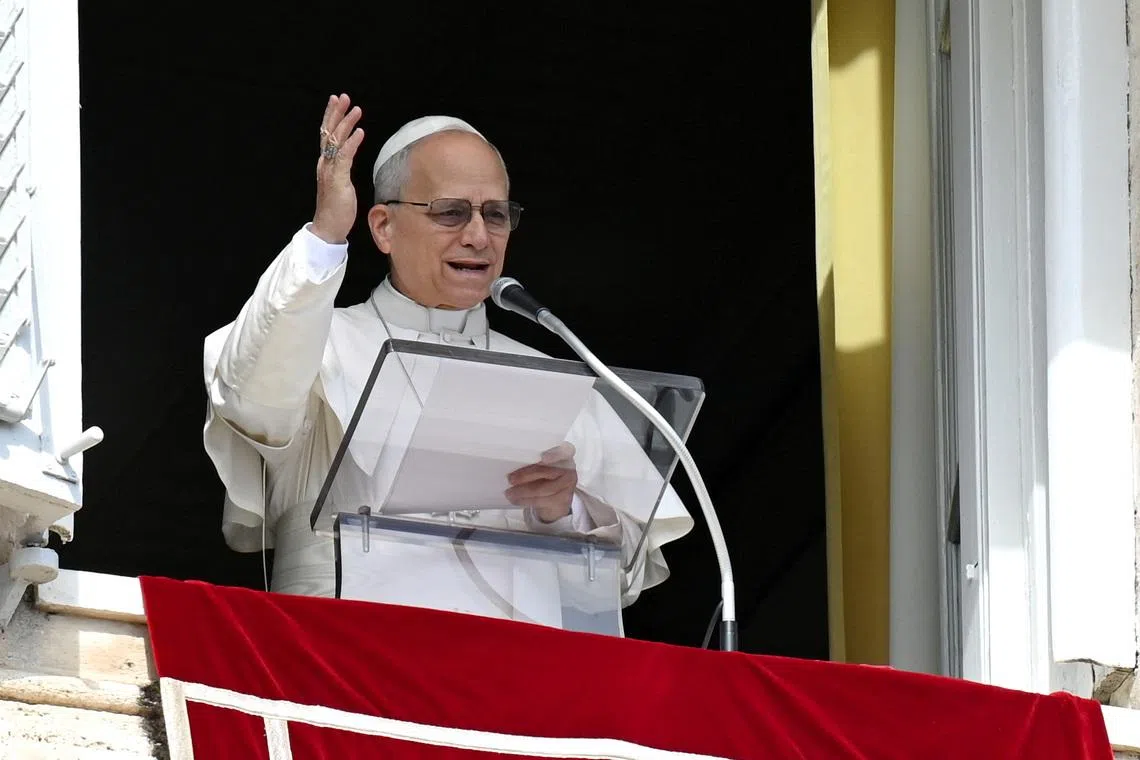 Pope Leo XIV leads the Angelus prayer from the window of the Apostolic Palace at the Vatican, March 8, 2026.   Vatican Media/­Handout via REUTERS