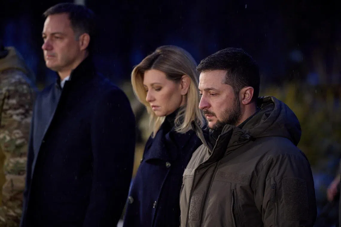 Mr Mykola Bielieskov says Mr Zelensky (right) is now tied to his promise to return Crimea.