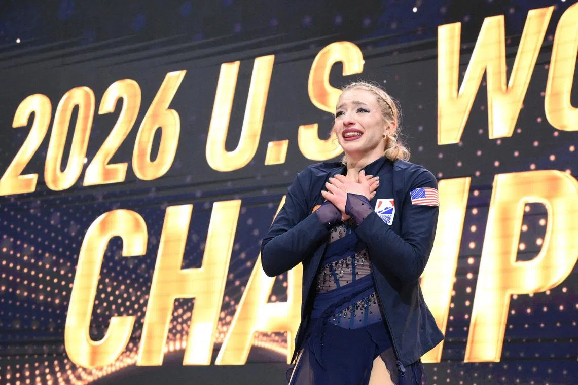 Jan 9, 2026; St. Louis, Missouri, UNITED STATES; Amber Glenn reacts after winning the championship womens free skate competition during the 2026 U.S. Figure Skating Championships at Enterprise Center. Mandatory Credit: Jeff Le-Imagn Images