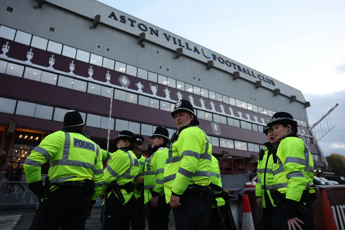 Soccer Football - UEFA Europa League - Aston Villa v Maccabi Tel Aviv - Villa Park, Birmingham, Britain - November 6, 2025 Police officers are seen outside the stadium before the match REUTERS/Hannah Mckay