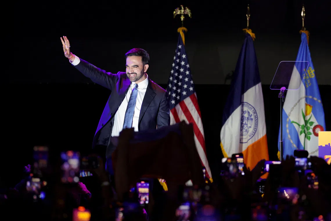 Democratic candidate for New York City mayor Zohran Mamdani waves to his supporters after winning the 2025 New York City Mayoral race, at an election night rally in the Brooklyn borough of New York City, New York, U.S., November 4, 2025. REUTERS/Jeenah Moon