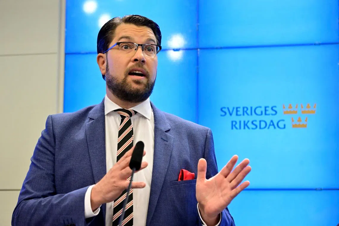 FILE PHOTO: Jimmie Akesson, leader of the Sweden Democrats Party, attends a news conference at the Parliament press office regarding the formation of the government, in Stockholm, Sweden October 14, 2022. TT News Agency/Jonas Ekstromer via REUTERS/File Photo