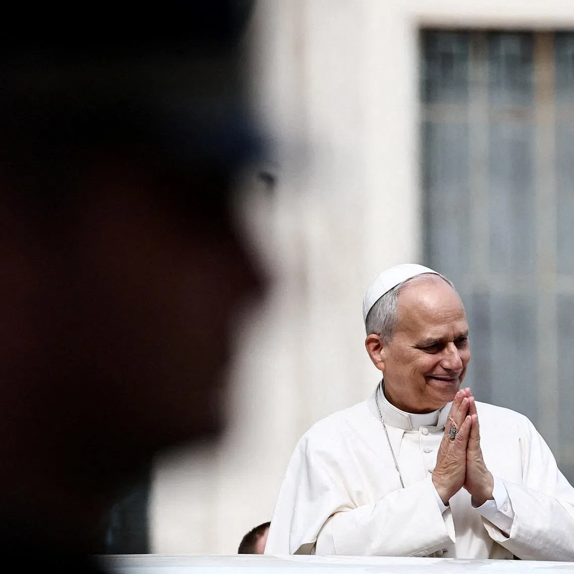 FILE PHOTO: Pope Leo XIV leaves following the weekly general audience in Saint Peter's Square at the Vatican, March 11, 2026. REUTERS/Yara Nardi/File Photo