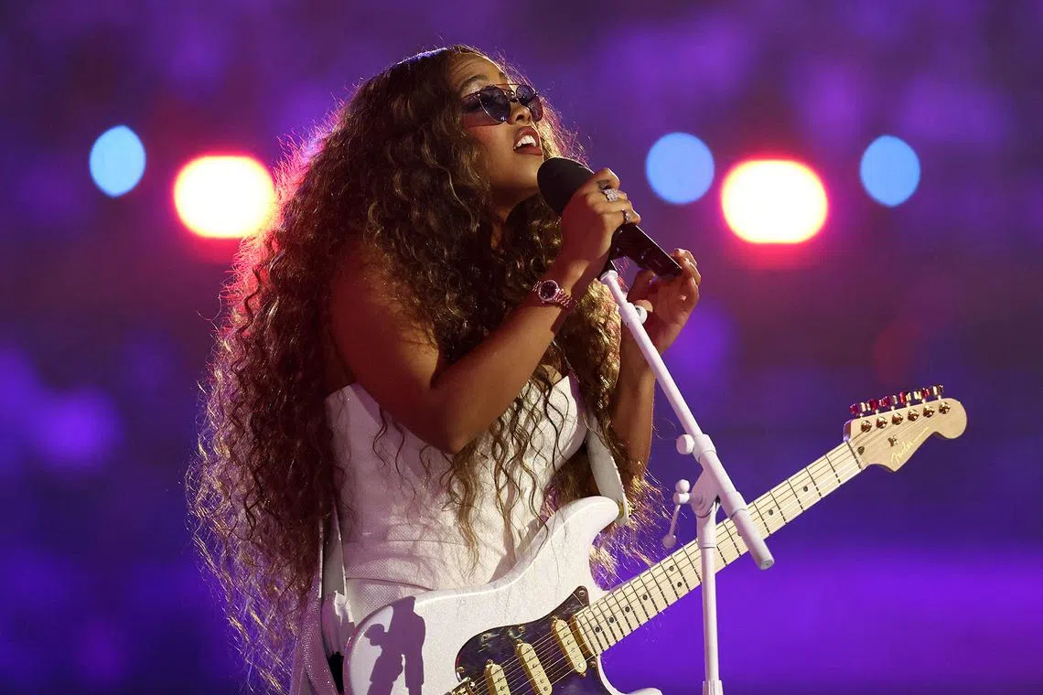 US singer H.E.R performing during the closing ceremony of the Paris Olympics at the Stade de France on Aug 11, 2024.