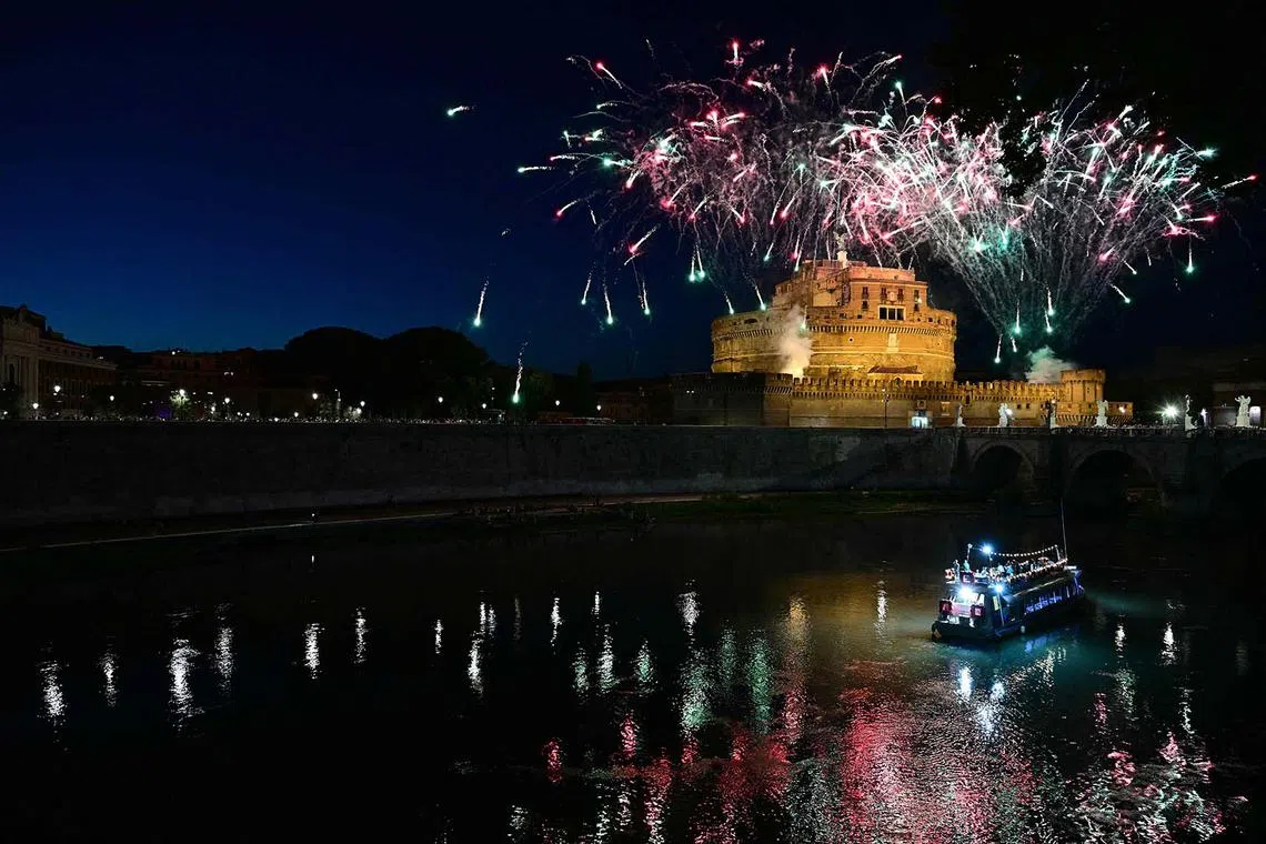 Fireworks burst in the sky over the Castel Sant'Angelo during the traditional Girandola, the feast of Rome’s patron St Peter and Paul, on June 29, 2025 in Rome. 
