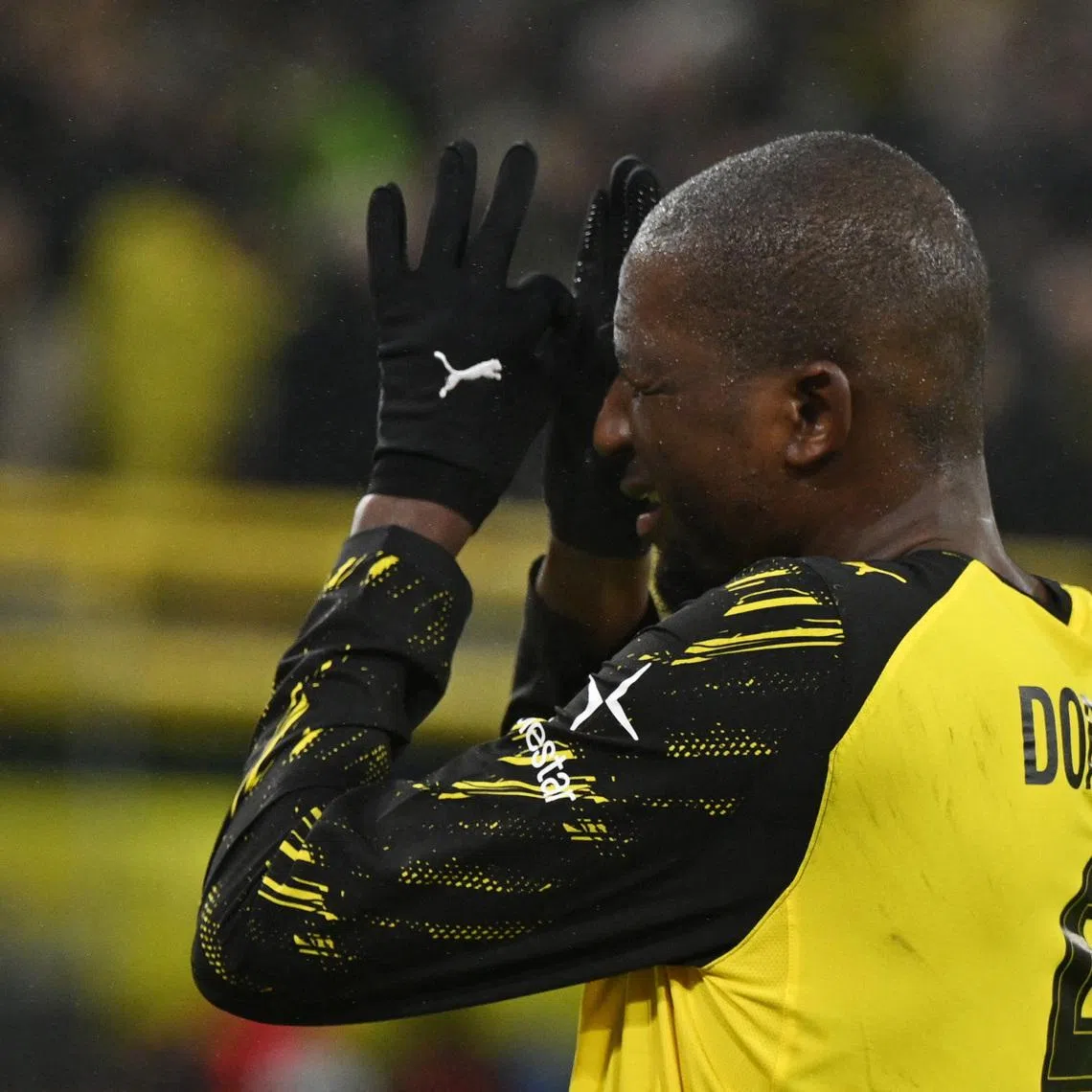 Soccer Football - Bundesliga - Borussia Dortmund v 1. FSV Mainz 05 - Signal Iduna Park, Dortmund, Germany - February 13, 2026 Borussia Dortmund's Serhou Guirassy celebrates scoring their third goal REUTERS/Teresa Kroeger