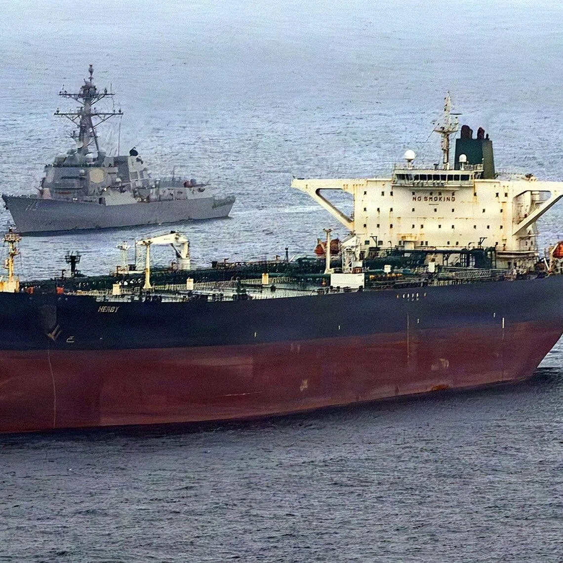 The Arleigh Burke-class destroyer USS Rafael Peralta intercepts the Iran-flagged oil tanker Herby.
