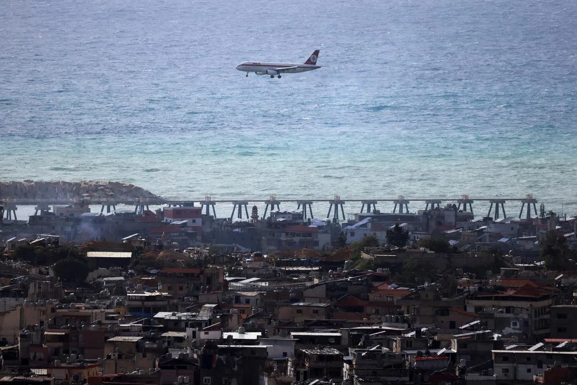 A Lebanese Middle East Airlines (MEA) aircraft approaches the Beirut-Rafic Hariri International Airport as it flies over Beirut's southern suburbs, amid escalating hostilities between Israel and Hezbollah, as the U.S.-Israeli conflict with Iran continues, Lebanon, March 30, 2026. REUTERS/Amr Abdallah Dalsh/File Photo