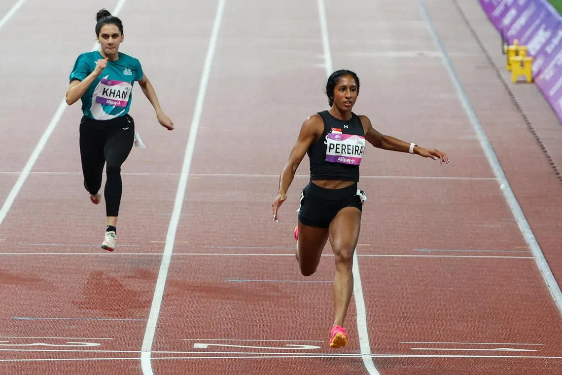 Shanti Pereira taking part in the 100m heats at the Asian Games in 2023. She broke the national records in the 100m and 200m that year.